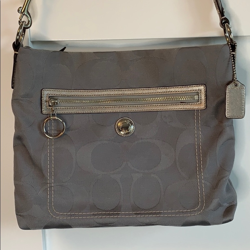 Coach crossbody silver bag with monogram detailing